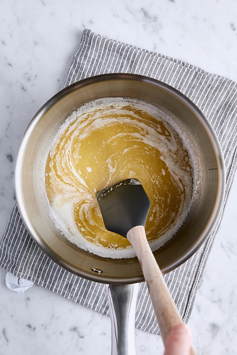 Melted butter in saucepan with spatula