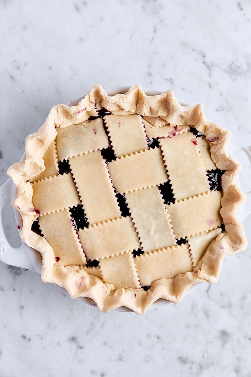 Assembled blueberry pie in pie pan