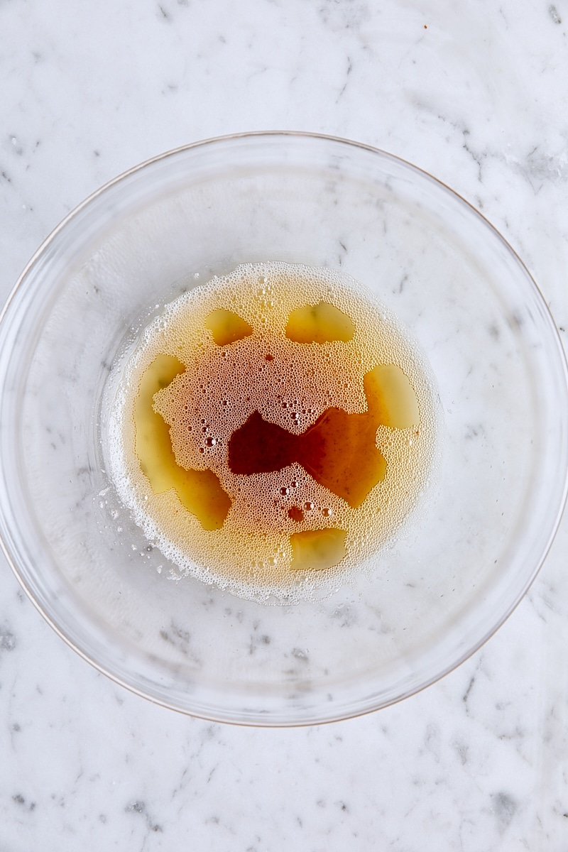 Melted brown butter in glass bowl