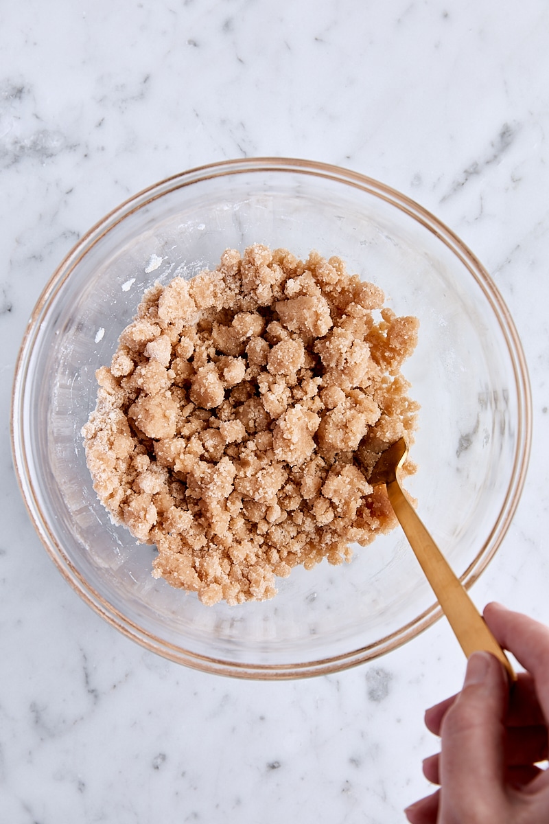 Mixed cinnamon crumb topping in glass bowl
