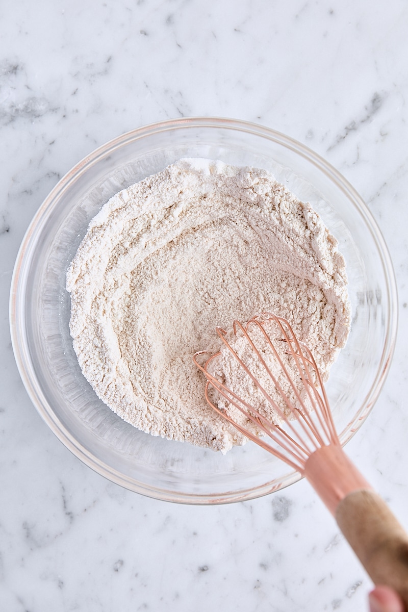 All-purpose flour, granulated sugar, cinnamon, and salt whisked together in small glass bowl