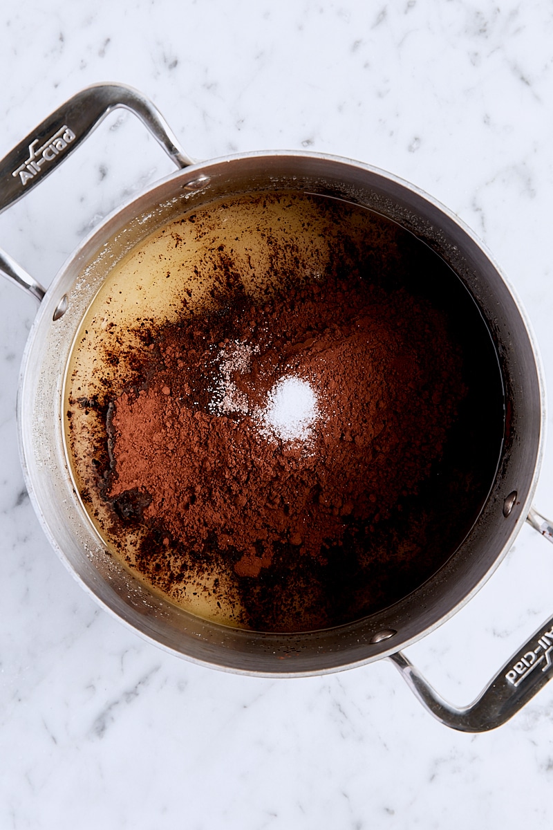 Cocoa powder, espresso powder, and salt added to saucepan