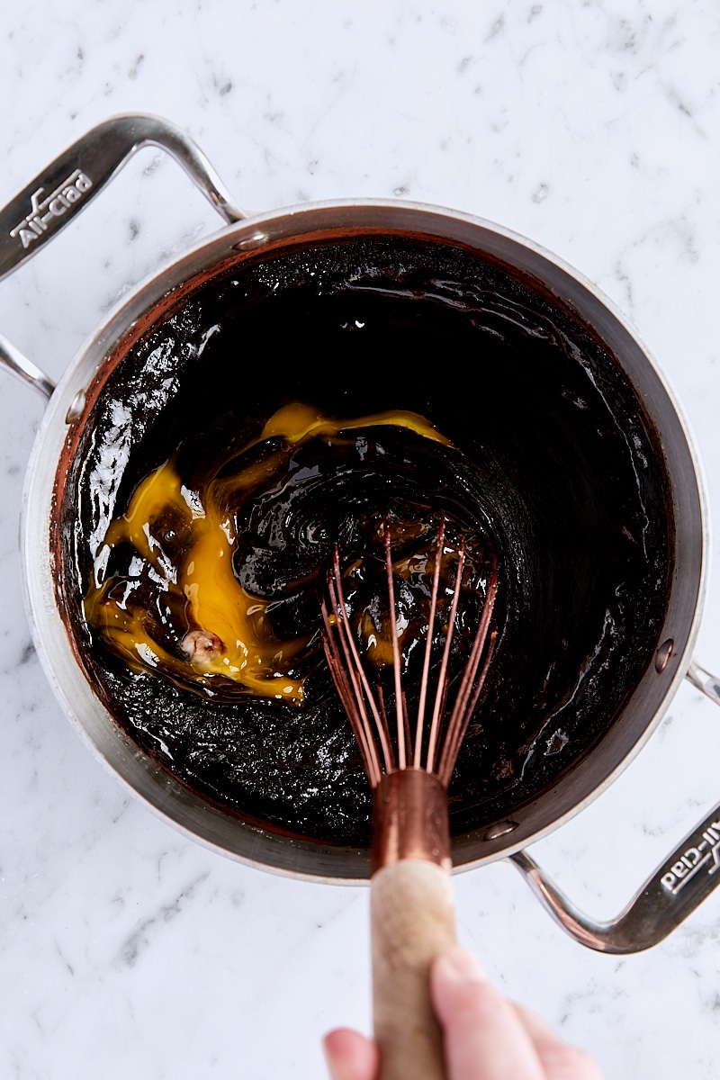 Whisking egg into brownie batter
