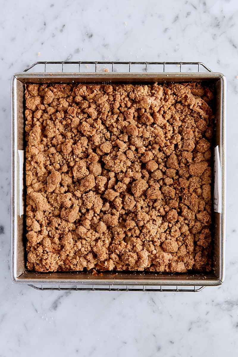 Baked crumb cake in parchment-lined pan