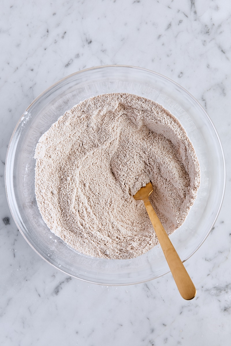 Crumb topping dry ingredients whisked together in glass bowl