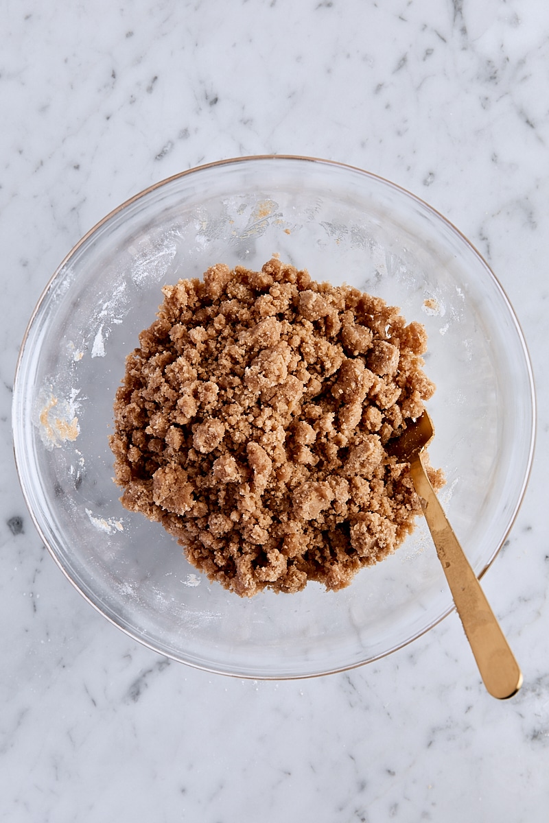 Mixed crumb topping in glass bowl with fork