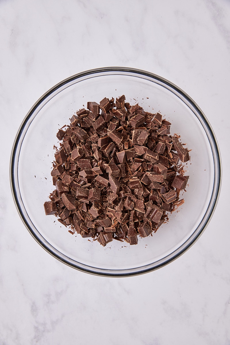 Chopped chocolate in glass bowl
