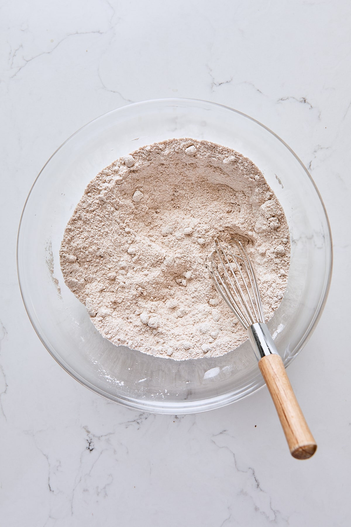 Crumb topping dry ingredients whisked together in glass bowl